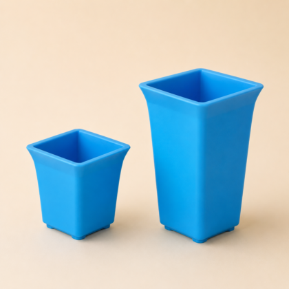 Two blue Aroma Planters in different sizes against a neutral background.