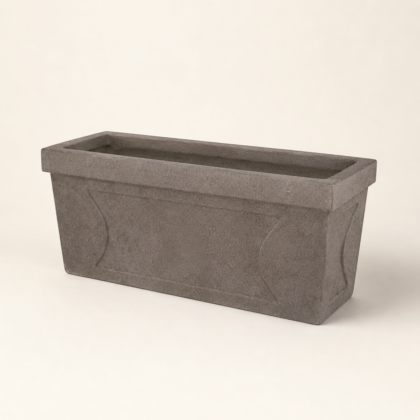 Jaguar Planter in a long, rectangular trough shape with recessed panel detailing on the side.