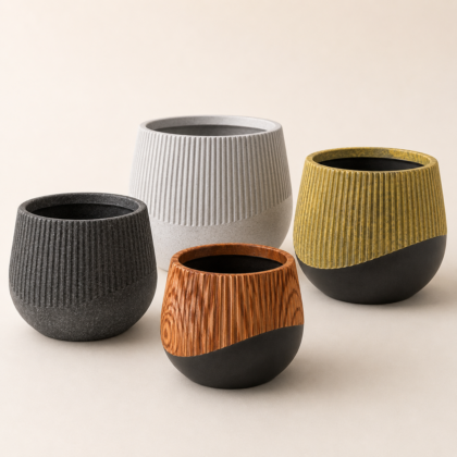 Four Lara Planters in various sizes, colors, and textures displayed against a neutral background.