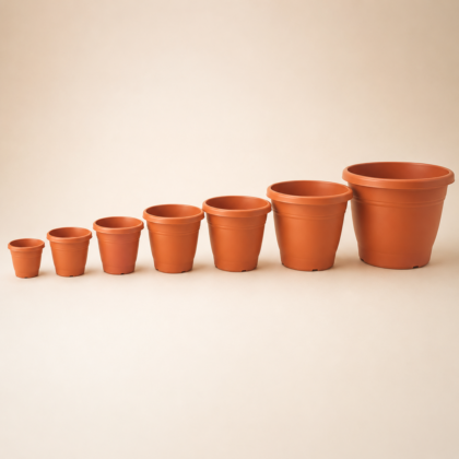 A lineup of seven Nova Garden Planters in increasing sizes, displayed against a neutral background.