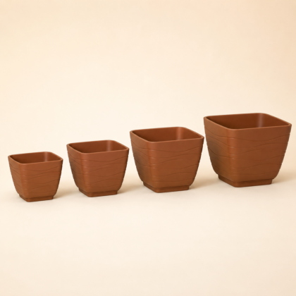 Four square Sterling Fancy Planters in increasing sizes with a wavy exterior texture.