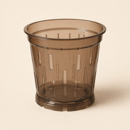 Transparent brown orchid pot with vertical ventilation slits on a light background.