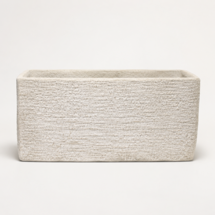 Rectangular textured wall planter in a neutral finish on a plain background.