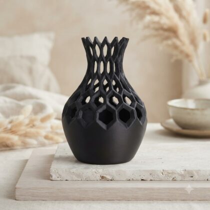 Black Hexa Flower Vase with an intricate hexagonal lattice pattern on a light surface.